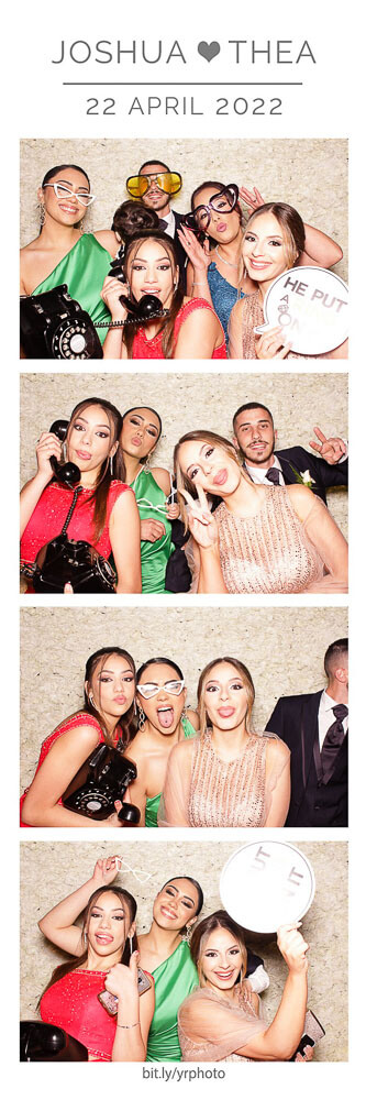 photo booth photo strip with flower wall and guests posing