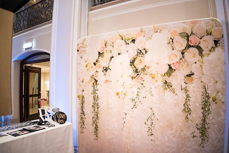 A floral backdrop for a photo booth at The Phoenicia Hotel Malta