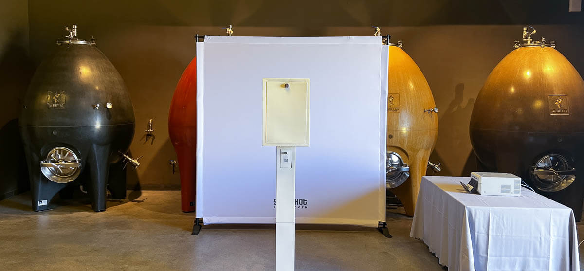 A modern photo booth in the fermentation room of the Ta Betta Wine Estates