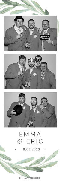 groomsmen posing in a black and white glam photo strip