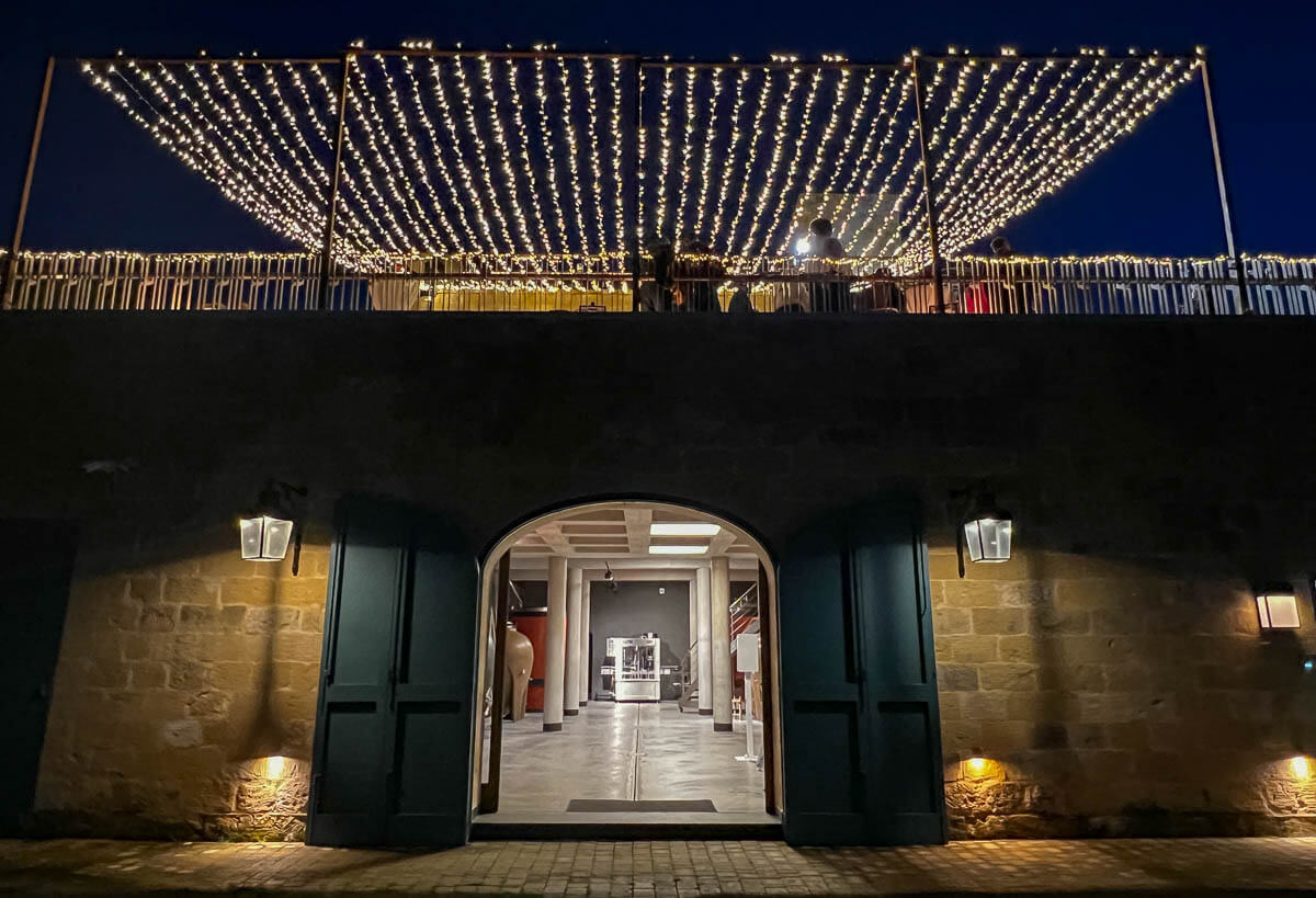 The Ta Betta Wine Estates venue by night showing the interior of the fermentation room