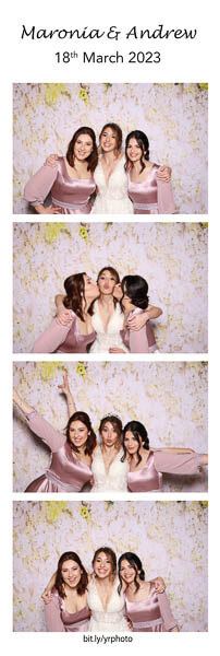 bridesmaids in a photo booth strip with a flower backdrop in Malta