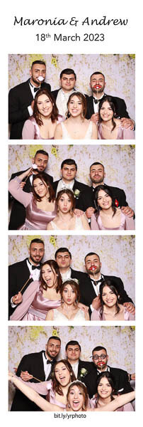 bridal party in photo booth strip with a flower backdrop in Malta