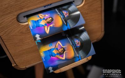 Album cover art Photo Booth prints coming out of a printer