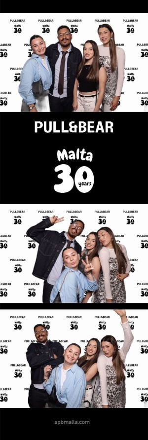 pull-and-bear-malta-30th-anniversary-guests-photo-strip-2 Photo strip of four friends posing playfully, making hand gestures and smiling in front of the event backdrop.