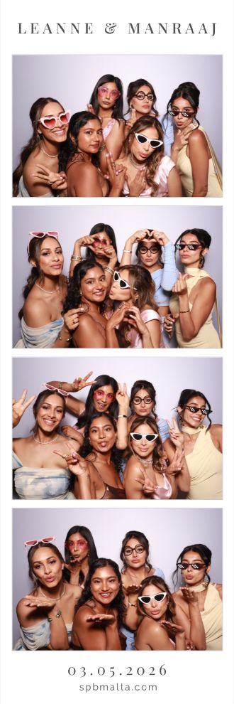 Snapshot-Photobooth-Malta-2 Wedding guests posing for a group photo in Malta.