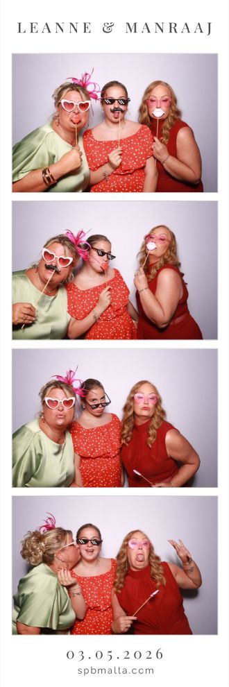 Snapshot-Photobooth-Malta-8 Wedding guests posing for a group shot in the photo booth.