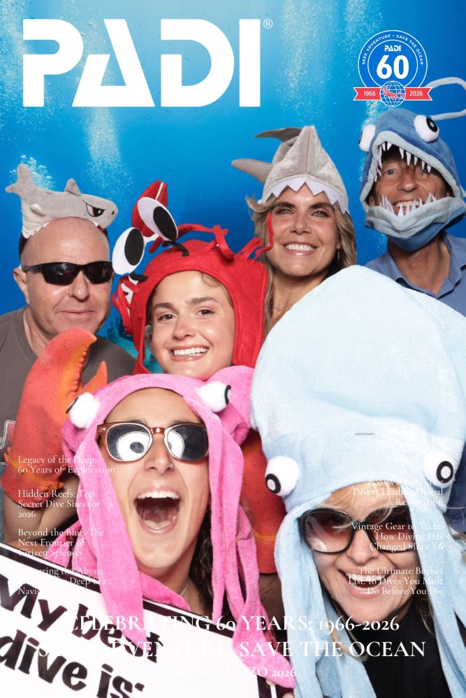 padi-guests-capturing-memories Excited guests posing and taking a photo at a PADI community gathering.