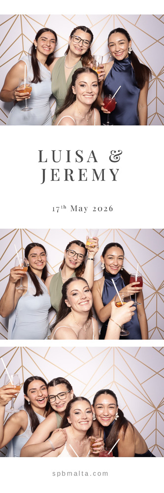 wedding-photo-booth-malta-group-of-four-women-photo-strip Friends posing in front of a photo booth.