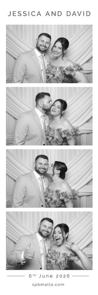 jessica & david-07 A couple posing for a black and white photo booth print in front of a draped white background at a luxury Malta wedding.