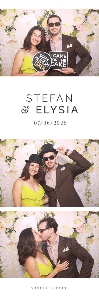 wedding-photo-booth-malta-couple-photo-strip-2 A wedding guest and her partner posing together in front of a white and pink floral wedding backdrop.