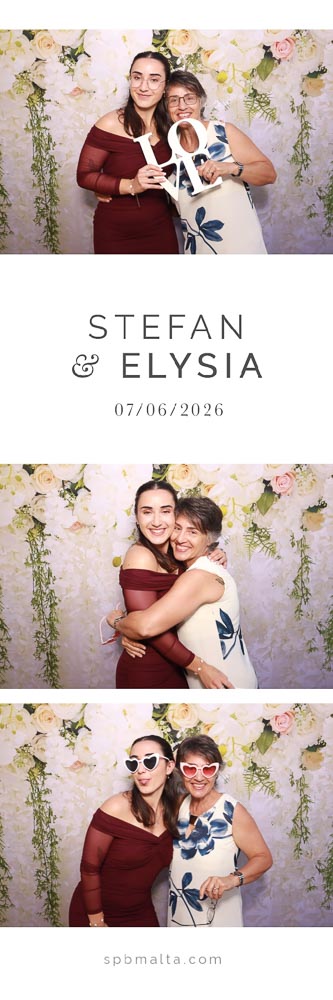 wedding-photo-booth-malta-two-women-photo-strip-2 Two women posing together in front of a pink and white floral backdrop.