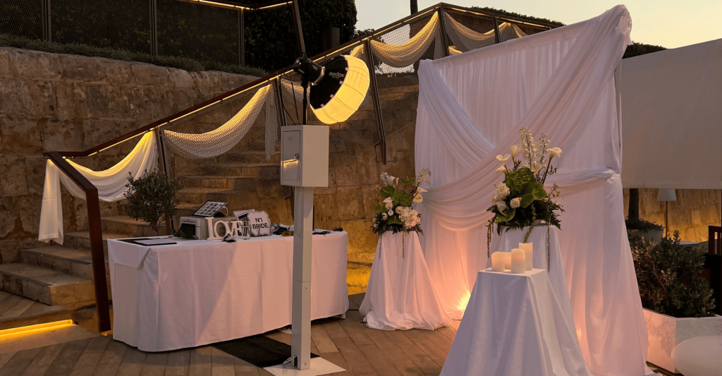 wedding setup Photo booth setup at a wedding reception in Malta, ready for guests to capture memorable moments.